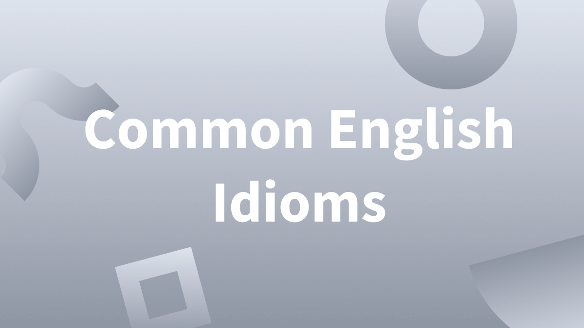 White text over gradient gray background reads: Common English Idioms.